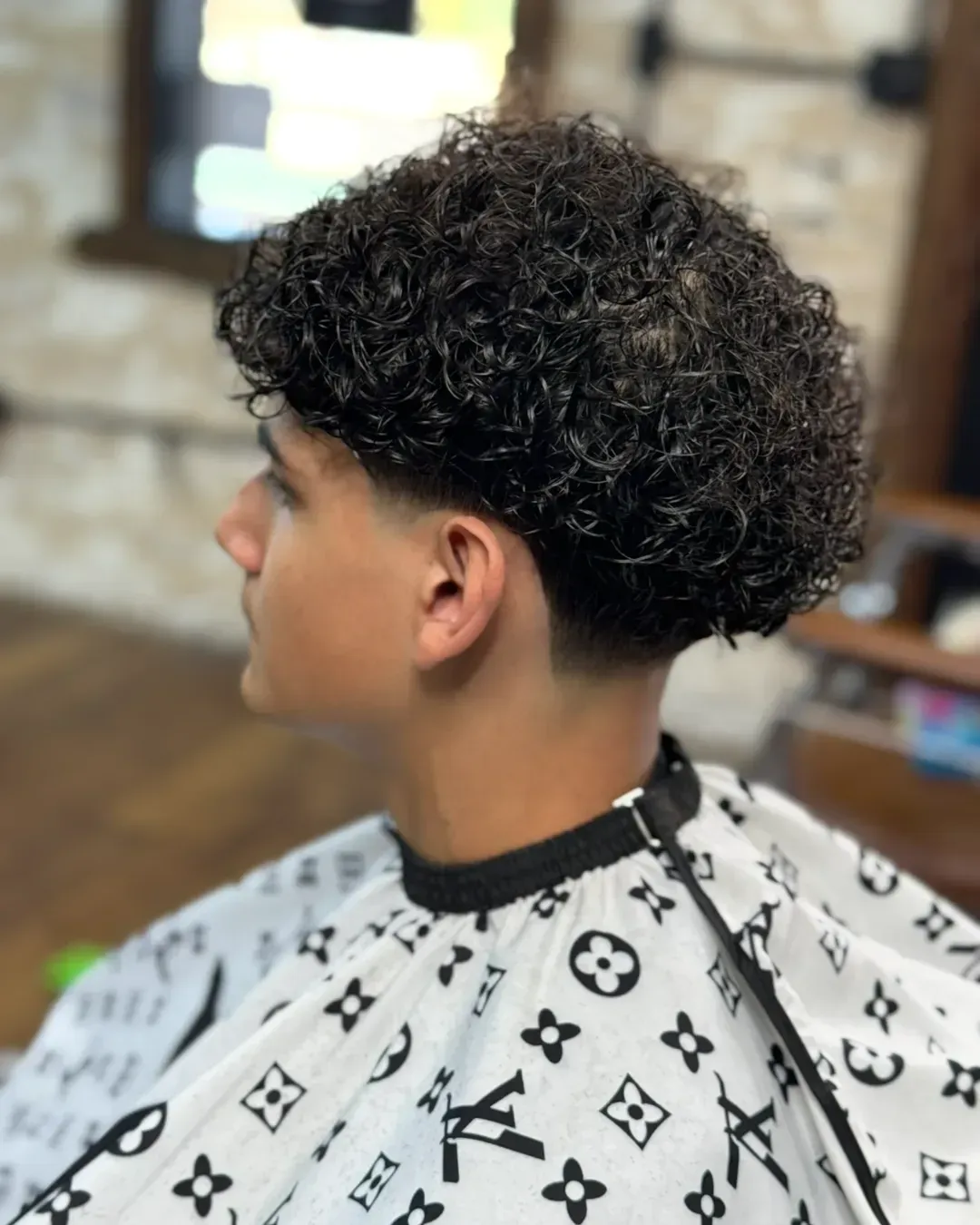 Men's perm with a clean fade at Dads Barber Shop in Queen Creek